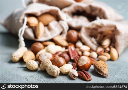nuts on a table, different kind of nuts