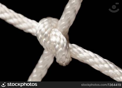 Nylon Rope Knot on a Black Background.