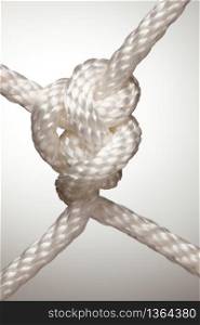 Nylon Rope Knot on a Spot Lit Background.