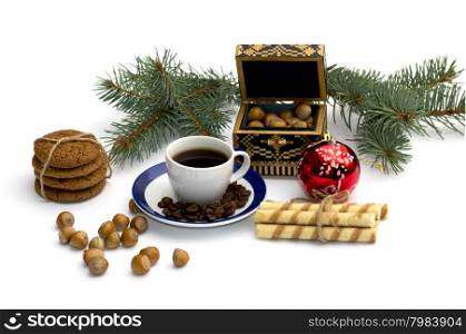 oat baking, a fir-tree branch with ornament, a trunk, sweets and nutlets, the subject Christmas and New Year