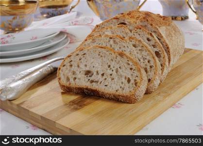 oat bread slices on wooden board