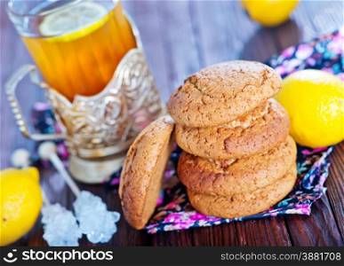 oat cookies and tea in cup on a table