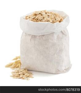 oat flakes in paper bag isolated on white background
