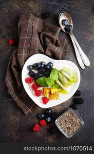 Oat flakes with fresh berries and fruits