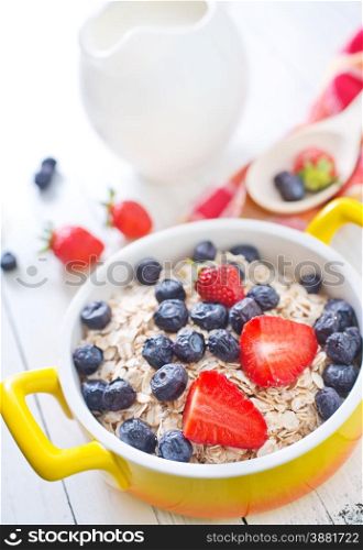 oat flakes with fruits in the bowl