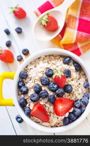 oat flakes with fruits in the bowl