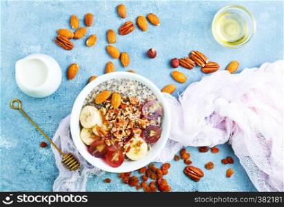 oat flakes with raisin and nuts in bowl