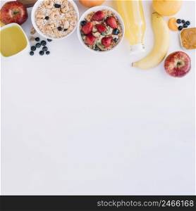 oatmeal bowls with different berries table