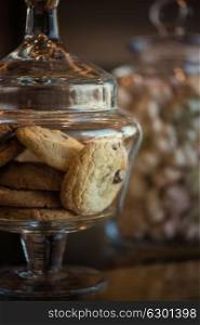 Oatmeal cookie in glass jar. Oatmeal cookie in glass jar, closeup photo