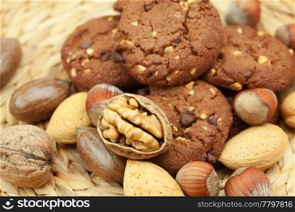 oatmeal cookies and nuts in a wicker mat