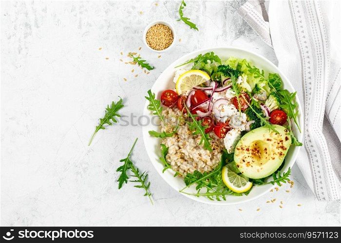 Oatmeal porridge with avocado, cottage cheese, tomatoes, fresh green salad and arugula. Healthy breakfast. Top view