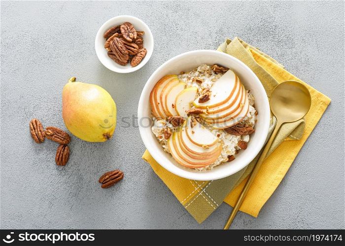 Oatmeal with cottage cheese, pecan nuts and pear for breakfast