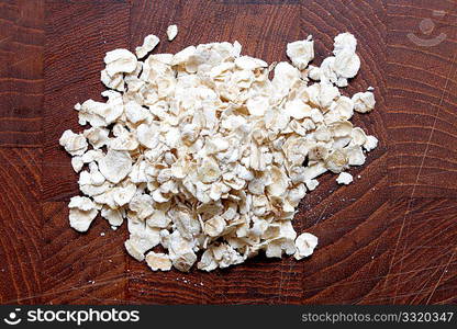 Oats in a heap isolated on white