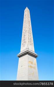 Obelisk Monument with blue sky at Place de la concorde in Paris France, Vertical