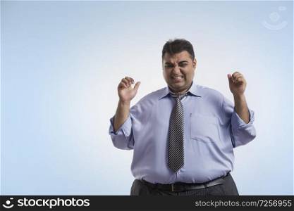 Obese man in formal clothes in frustrated mood