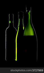 object on black - cognac and sparkling bottle on black