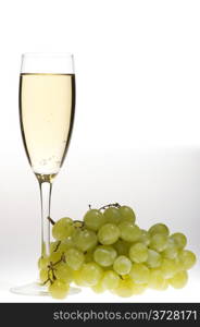 object on grey - champagne glasses with grapes