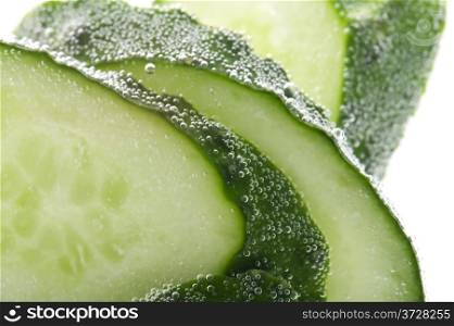 object on white - food cucumber in water
