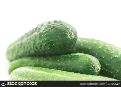 object on white - food raw green cucumber