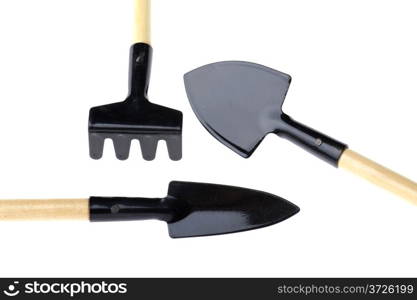 object on white - garden tool spade and rake