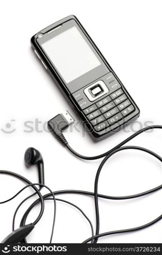 object on white - mobile phone with head set