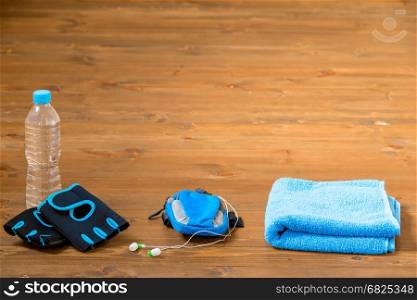 Objects for sports for men on the wooden floor