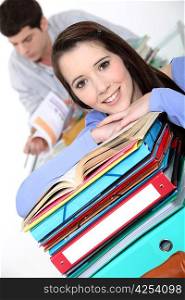 Oblique image of students with folders