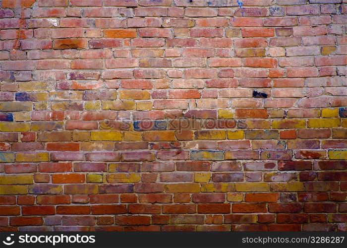 obsolete multicolored brick wall