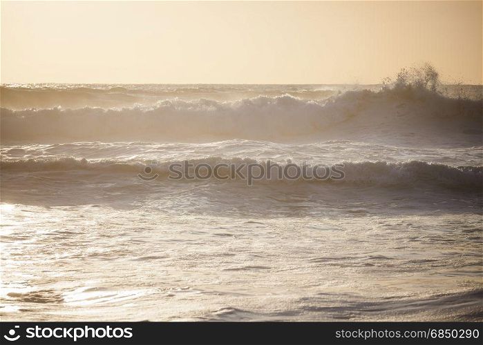 Ocean big waves. Stormy sunset seascape