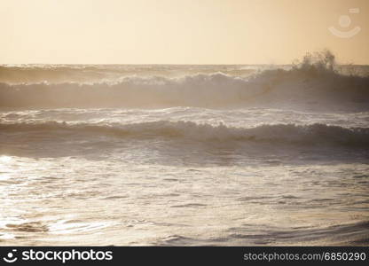 Ocean big waves. Stormy sunset seascape