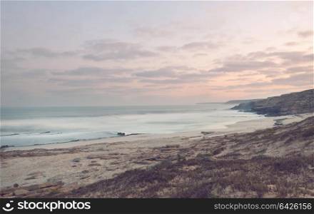 Ocean coast after sunset, Instagram filter.