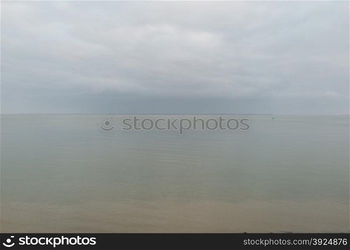 Ocean landscape. Ocean landscape with gray tones and calm sea