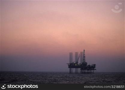 Ocean Oil Rig at Sunset