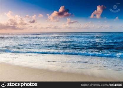 Ocean sunset. Blue sky and clouds. Beauty natural background. Ocean sunset