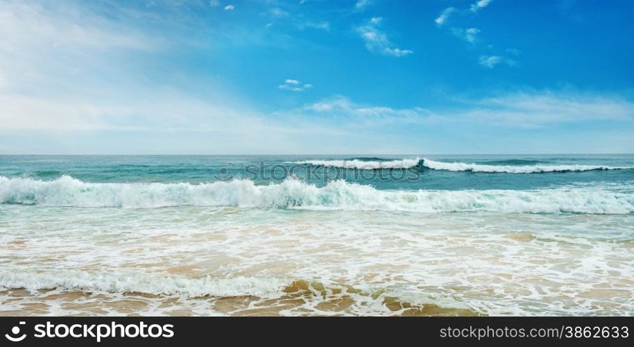 Ocean waves and blue sky