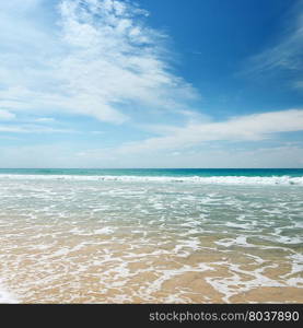 Ocean waves and blue sky