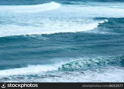 Ocean waves with foam. Nature background.