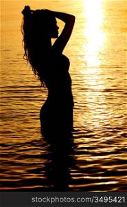ocean woman in sunrise light
