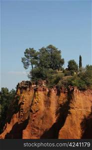 Ochre colored rocks in Roussillon in the South of France