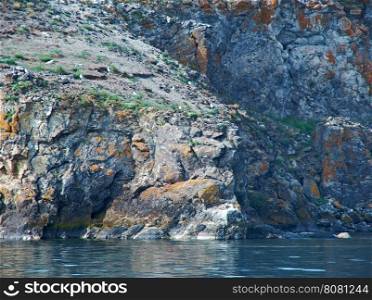 ocky cliff on the shore , Olkhon island, lake Baikal, Siberia, Russia
