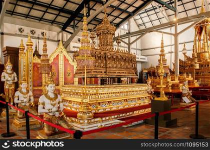 OCT 24, 2019 Bangkok, Thailand - Bangkok National Museum King Bhumibol Rama IX Golden Royal urn casket and funeral ornaments angel sculptures