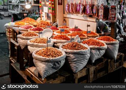 OCT 24, 2019 Bangkok, Thailand - Bangkok Street vendor sells dried seafood and dried shrimp both retail and whole sale in Tha tian local market near Grand palace