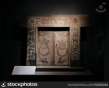 OCT 24, 2019 Bangkok, Thailand - Qin Shi Huang Emperor tomb stone gate. Famous part from Terracotta Army museum in Xian, China was exhibited in Bangkok at National museum