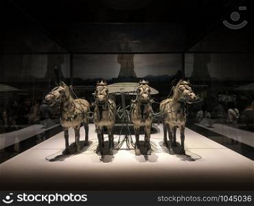 OCT 24, 2019 Bangkok, Thailand - War horse carriage from Qin Shi Huang tomb mausoleum Terracotta Army museum in Xian, China was exhibited in Bangkok at National museum