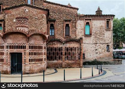 OCT 26, 2012 Barcelona, Spain - Red brick vintage building of Ca l&rsquo;Ordal house in La Colonia Guell near Gaudi Crypt