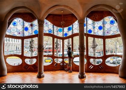 OCT 26, 2012 Barcelona, Spain - Tourist at Casa batllo with extraordinary mansion interior was design by Antoni Gaudi, the most famous Spanish architect.
