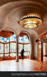 OCT 26, 2012 Barcelona, Spain - Tourist at Casa batllo with extraordinary mansion interior was design by Antoni Gaudi, the most famous Spanish architect.
