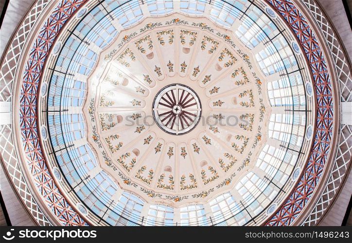 OCT 29, 2012 Valencia, Spain - Stained glass dome roof of Valencia Central Market or Mercat Central. Builted in 1914 Valencian Art Nouveau style architecture
