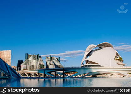 OCT 31, 2012 Valencia, Spain - Modern Architecture of City of Arts and Sciences and blue pool under blue sky. Architecture designed by Santiago Calatrava and Felix Candela