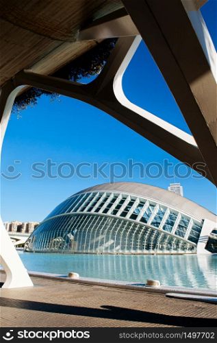 OCT 31, 2012 Valencia, Spain - Modern Architecture of City of Arts and Sciences and blue pool under blue sky. Architecture designed by Santiago Calatrava and Felix Candela